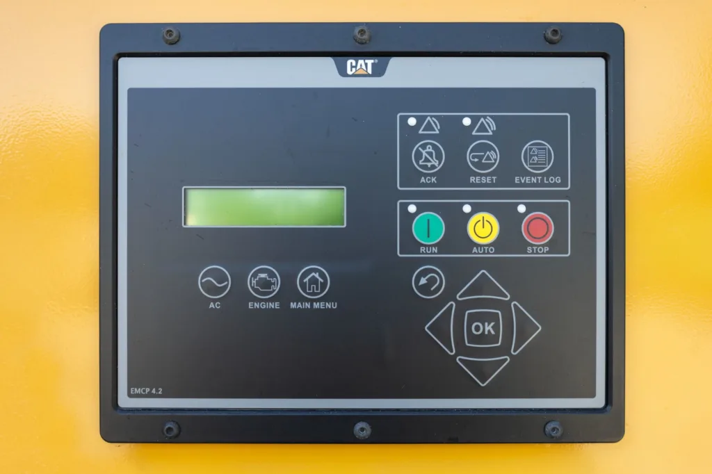Control systems like the transfer switch, battery compartment and power buttons.