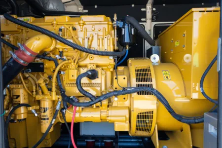 A diesel generator engine inside of a Caterpillar diesel generator.