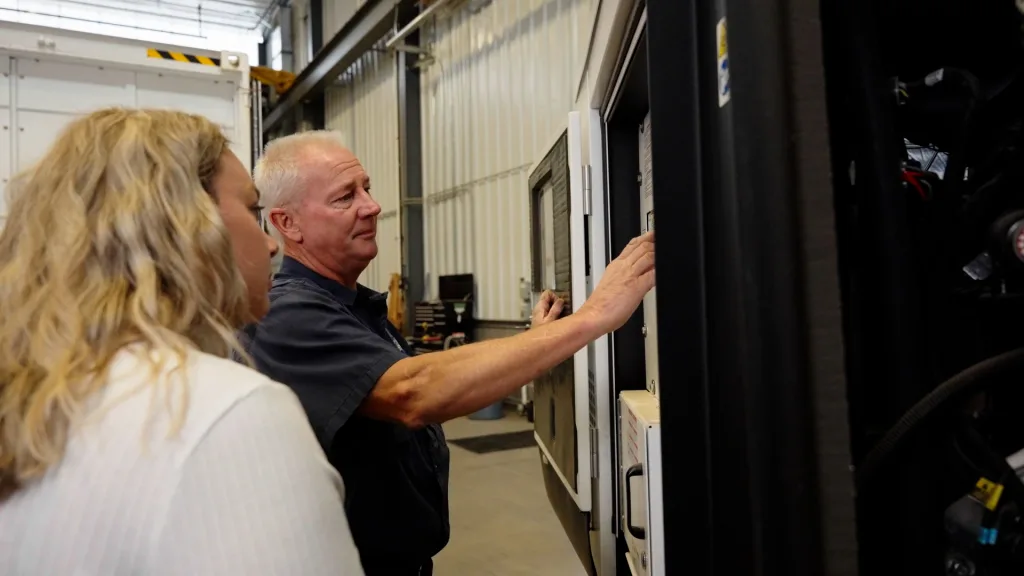 Generator Source representative assisting a customer in choosing the right industrial generator.