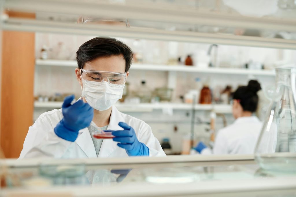 Meeting NFPA 99 & 110 Standards, A Guide to Healthcare Backup Power Compliance 2 A scientist in a hospital laboratory works on a sample a critical function protected by an emergency power supply system