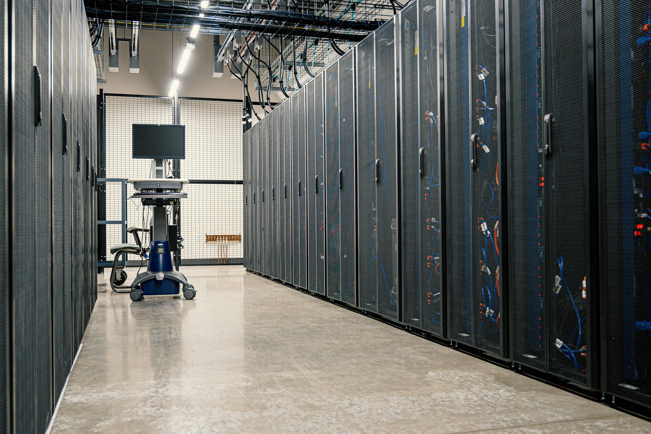 Paralleling Switchgear Explained: How We Power Hyperscale Data Center Growth 1 Infrastructure of a modern hyperscale data center aisle scaled