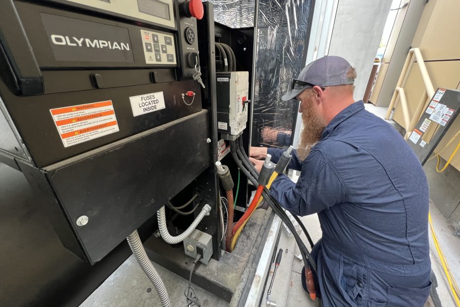 Service Tech Servicing a Generator The Most Common Generator Service Issues We See In the Field