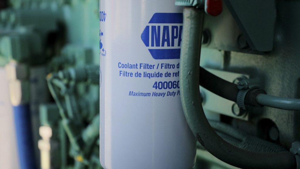 Coolant test strips showing pH and reserve alkalinity levels