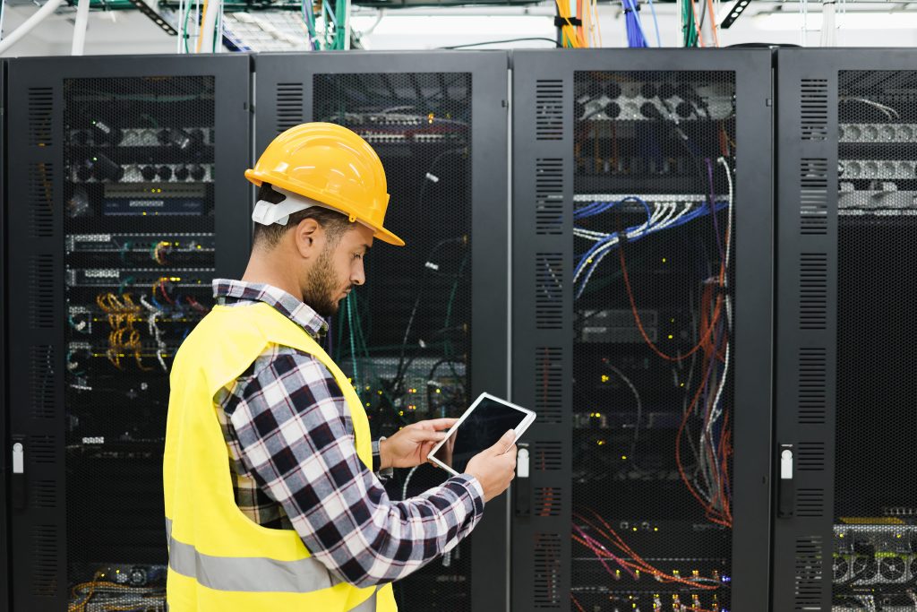 Data center operator testing servers Backup Power for Data Centers